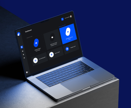 A laptop on a dark surface with a deep blue background, displaying a modern dark-themed dashboard interface featuring large blue and white icons for uploading and labeling videos, seeing pending work, managing users, and browsing assets.